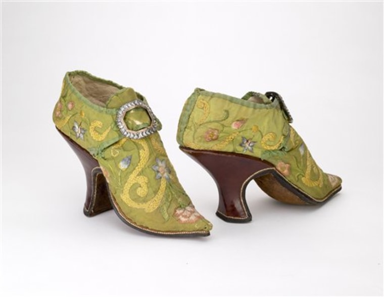This undated photo courtesy of the Bata Shoe Museum Toronto/Hal Roth shows Green shoes, Italian, 1700-1720. These preserved high-heeled shoes date to the early 1700s. The heels are made of bevel-carved wood covered in deep red Moroccan leather.